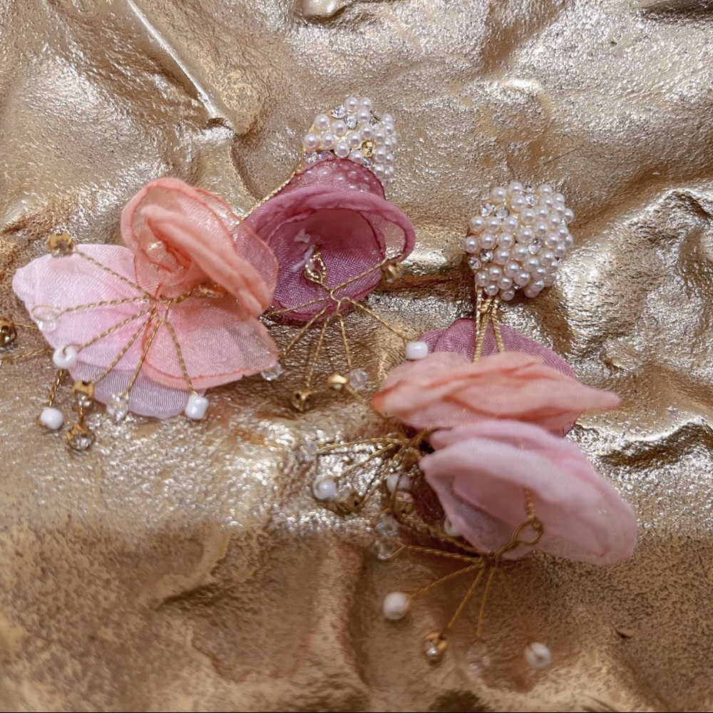 Brand new floral designed pink color earrings